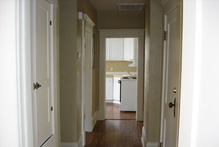 Hallway with storage looking toward kitchen - 3550 East Douglas Avenue