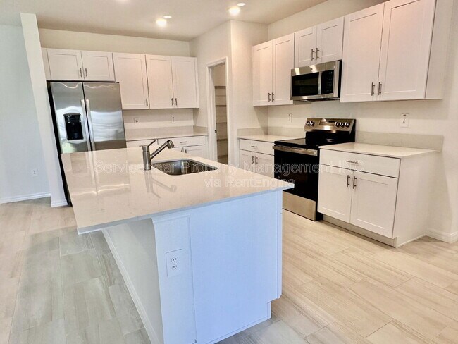 Building Photo - 8406 Blue Wave Ln E