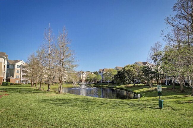 Building Photo - Peaceful Pond Views + Open Layout | 2BR + Office in Prime Location