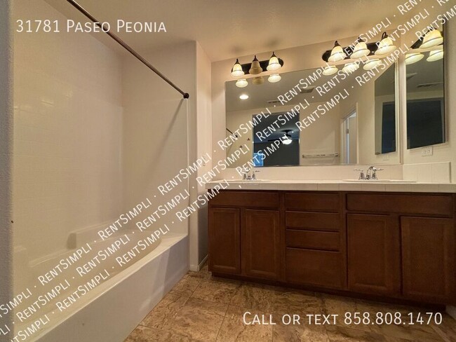 Building Photo - 2 BR 2.5 BA Condo located in The Paseos at...