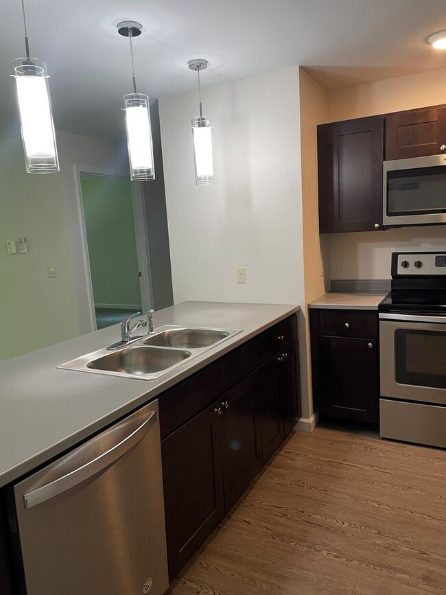 Building Photo - One Bedroom End Unit