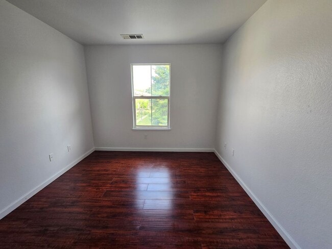 Building Photo - Beautifully Remodeled Tri Story Home located in a Gated Community ...