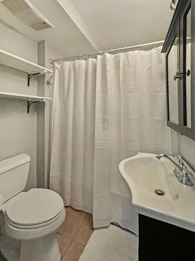 Building Photo - Seeking a roommate for a 2 bdr, 2 bath lower level condo with a porch and private yard, 1.5 miles...