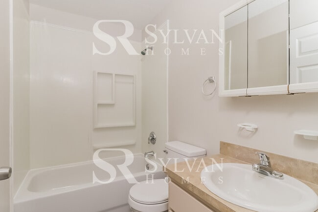 Building Photo - This charming home is ready for your personal touch!