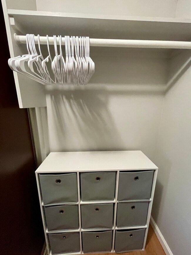 Walk in closet with storage. - 1521 Alexander St