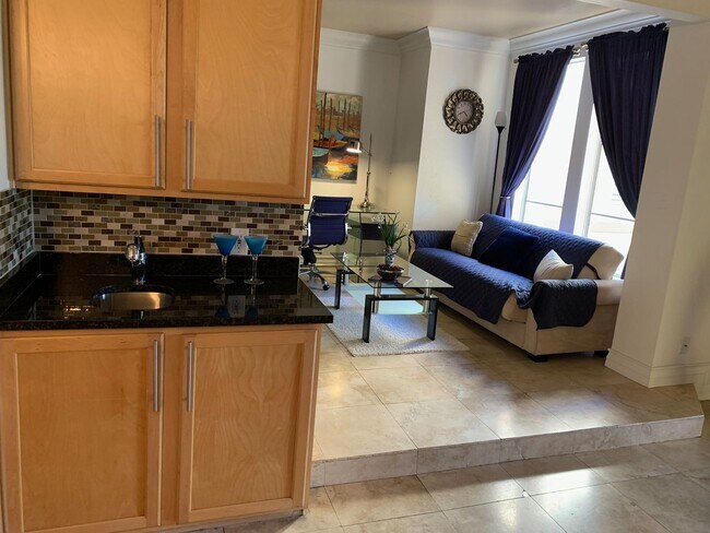 Building Photo - Meridian-FURNISHED 2 BDR /2 BATH + Den Lux...