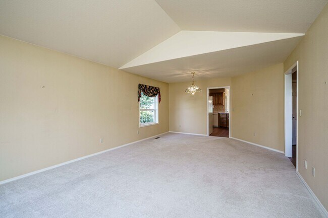 Building Photo - Beautifully Landscaped 1/4 acre with Well Maintained 4 bedroom 2 Bath Home with 3 Car Garage