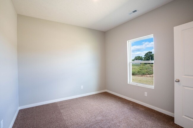 Building Photo - BRAND NEW 3 BEDROOM HOME WITH 3 CAR GARAGE