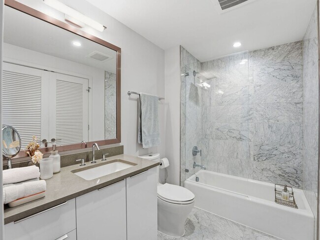 Building Photo - Designer-Furnished Waterfront Living at VIO Condominiums!