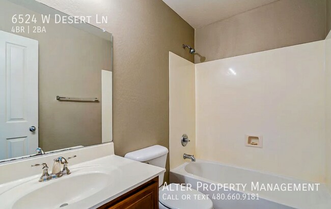 Building Photo - 6524 W Desert Ln