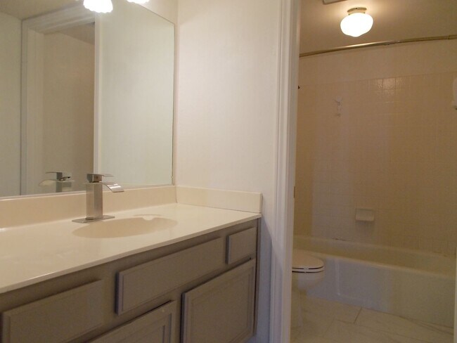 Building Photo - Two-story, 2-bedroom townhome ideally located in the heart of Boulder City