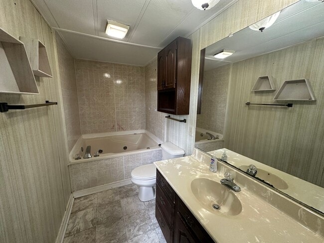Building Photo - Inviting 3 Bedroom - 2 Bath Home with Lots...