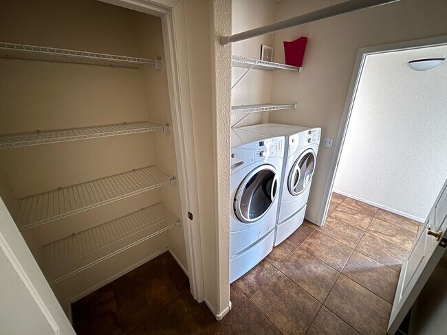 Building Photo - Charming 2Bed/Bath Condo located in a beautiful gated community in the Southwest.