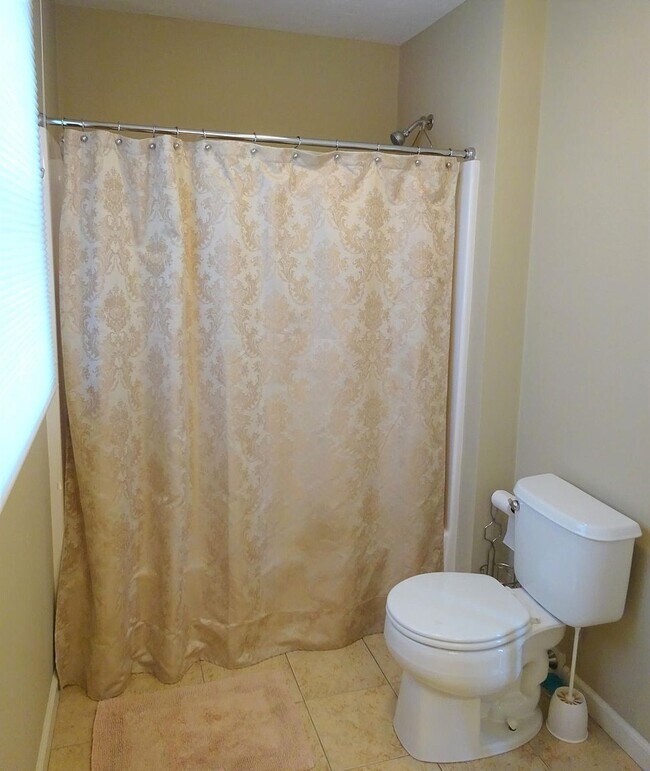 Guest Bathroom with Tub - 24 Autumn Ln