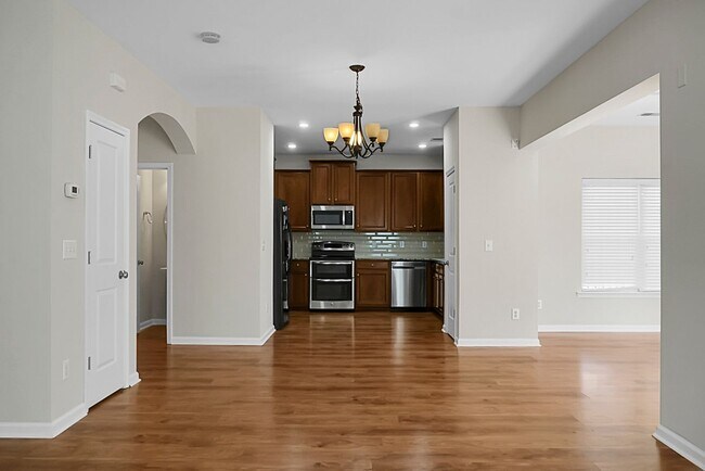 Building Photo - Comfortable Living, 4 BR 2.5 BA Home, Two Car Garage