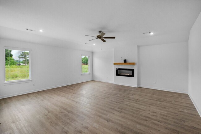 Building Photo - Stunning New 4-Bedroom Home with Modern Up...