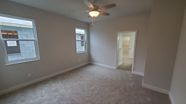 Building Photo - NEW 4/3.5/2 Venetian Bay Home