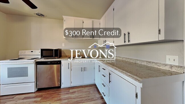 Building Photo - $300 Rent Credit - Inviting 2-bedroom 4-pl...