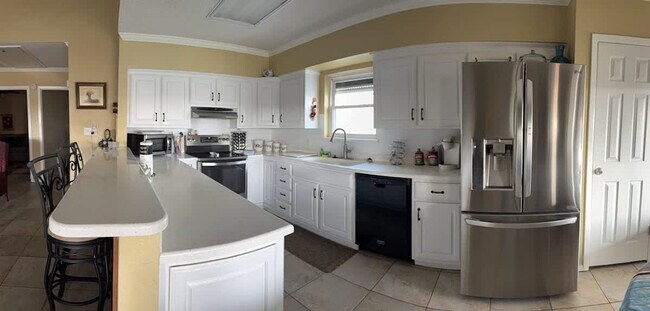 Building Photo - 1209 Pompano Ave