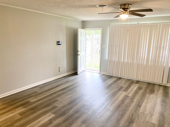 Building Photo - Charming 4BR/2BA Brick Home