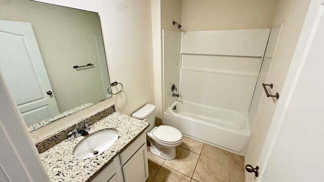 Building Photo - Available NOW! Spacious 4BD/2BA Haven in Villages at Harmony – Your Dream Home Awaits! WASHER & D...