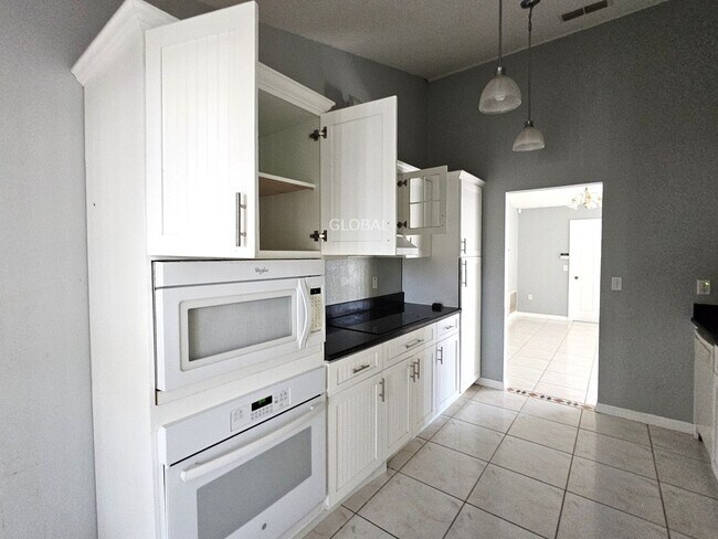 Building Photo - Spacious 4-Bedroom Home with Pool - July 10th move in date