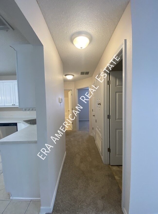 Building Photo - 7418 Woodmont Rd