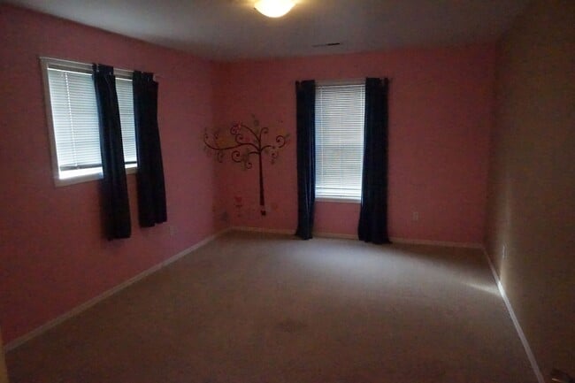 Building Photo - Large lot with room for a garden