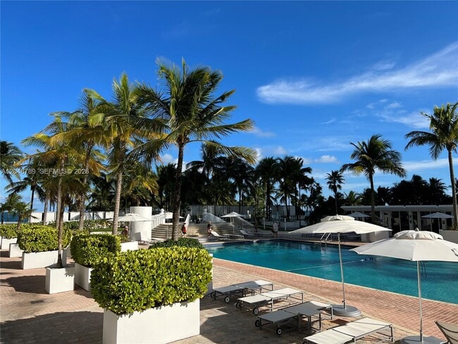 Building Photo - 10275 Collins Ave