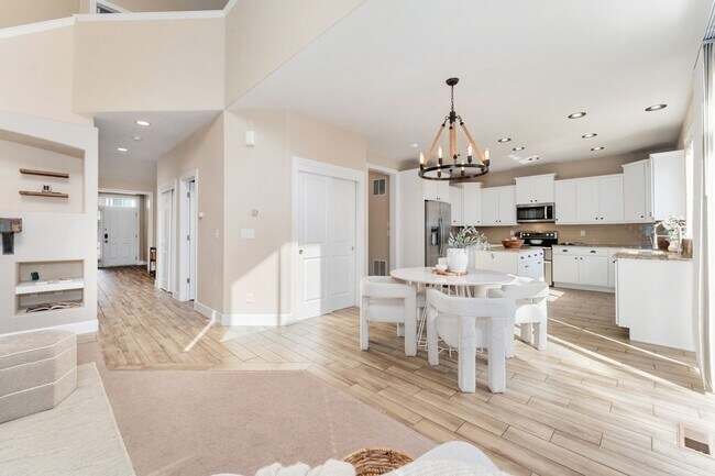 Building Photo - Evolve Real Estate: Evolve Real Estate: Meticulous Executive 4 Bedroom Plus Den Plus Finished Bas...