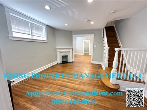 Building Photo - Newly Renovated large 3 bedroom 1 and a ha...