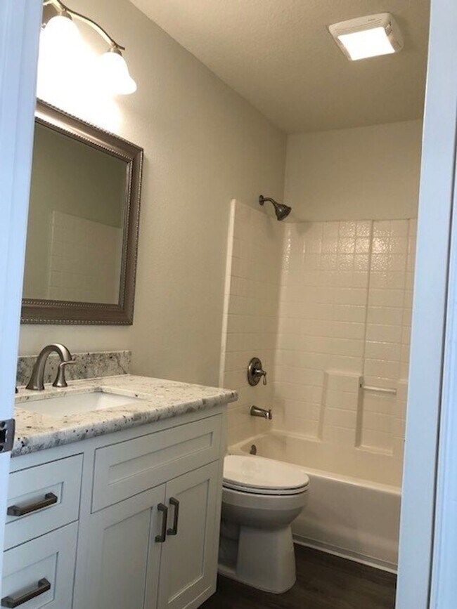 Building Photo - PICTURE PERFECT 2 BR/2 BATH PLUS LOFT END UNIT CONDO WITH DIRECT ACCESS 2 CAR GARAGE