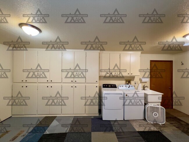 Building Photo - Spacious 3BR, 2.5BA Home off Chena Hot Springs Rd with Yard, Deck & Greenhouse