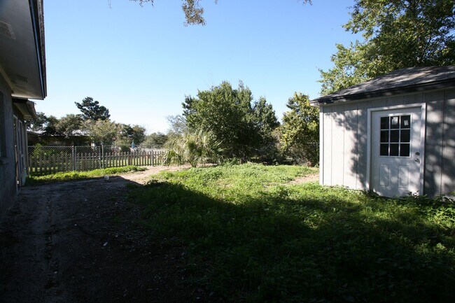 Building Photo - 3 bedroom home with large yard on the west end!
