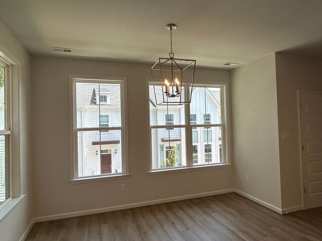 Building Photo - Luxury End-Unit Townhome with 2-Car Garage, Deck & Bonus Room – Available June 5!