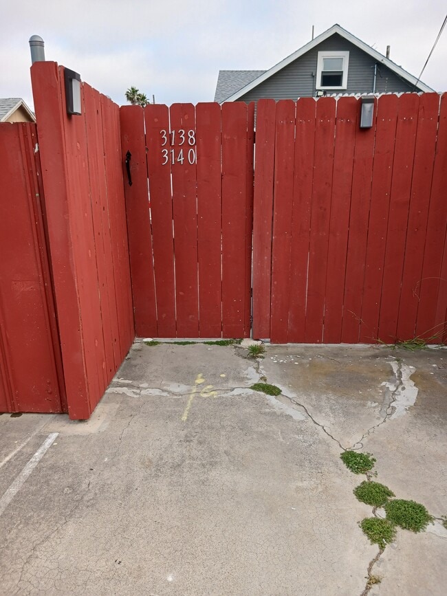 Entrance from alley and parking spot - 3138 Collier Ave