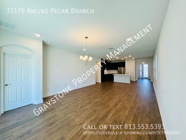 Building Photo - "Luxury Living in Wesley Chapel: Spacious ...