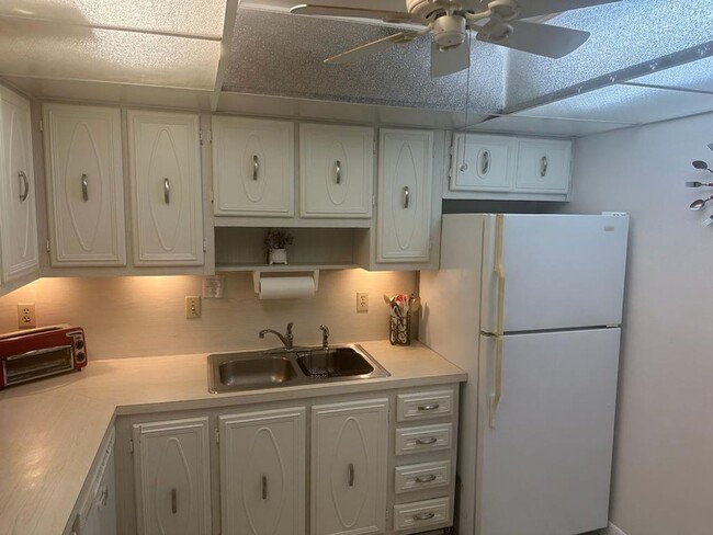 Building Photo - Furnished 2 Bedroom, 2 bath condo across f...