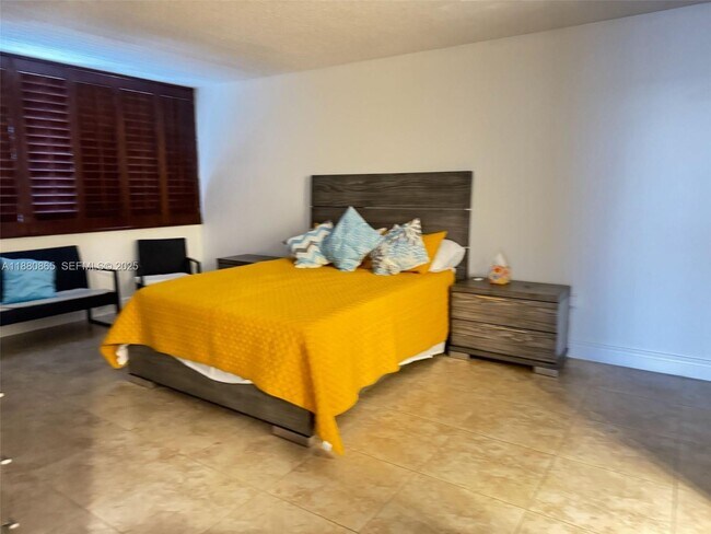 Building Photo - 5838 Collins Ave