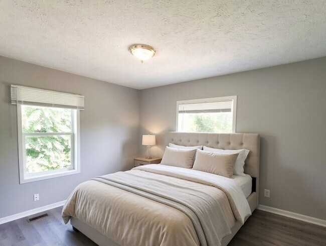 Building Photo - 4 Bed / 2 Full Bath House with Brand-New Kitchen, Attached Garage, and Full Basement - Built 2001