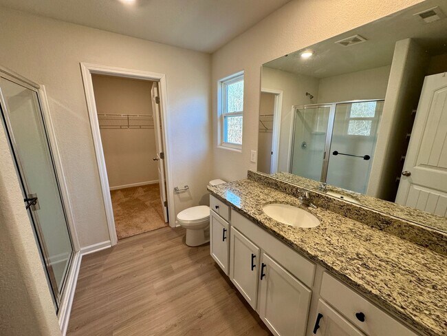 Building Photo - Located in Creedmore Hills a 4BR/2.5BA home with 2 car garage