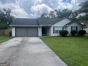 Building Photo - 205 Royal Pines Way