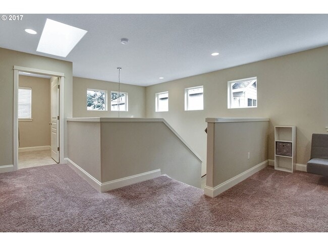 Building Photo - Bright and Open Floor Plan with Fireplace, Attached Garage & Vaulted Ceilings