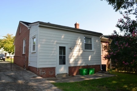 Building Photo - 3 BR/ 1 BA Lakeside Three bedroom with large fenced yard and detached garage/workshop
