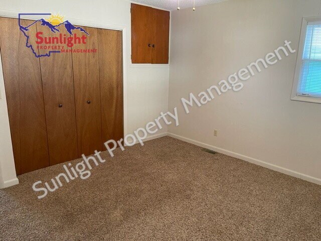 Building Photo - "Charming 2-Bed, 2-Bath Retreat in Laurel, MT – Your Perfect 1148 Sq Ft Haven on 5th Ave Awaits!"