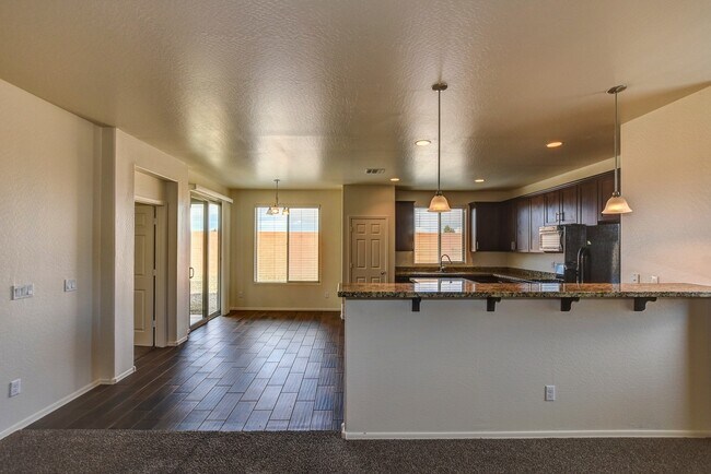 Building Photo - 3 Bedroom + a Den For Rent In Pronghorn Ra...