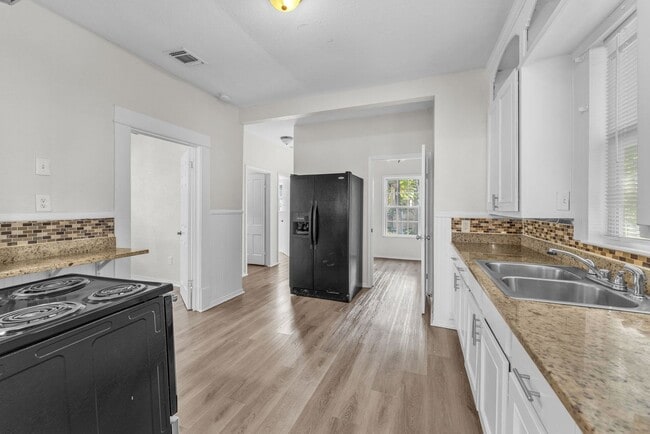 Building Photo - All Units Are Available With Brandnew Full Appliance Package