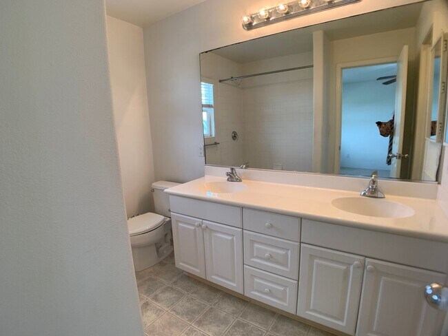 Building Photo - 3 bedrooms with A/C & 2 car garage in Ewa Beach (Spinnaker Place Townhomes)!