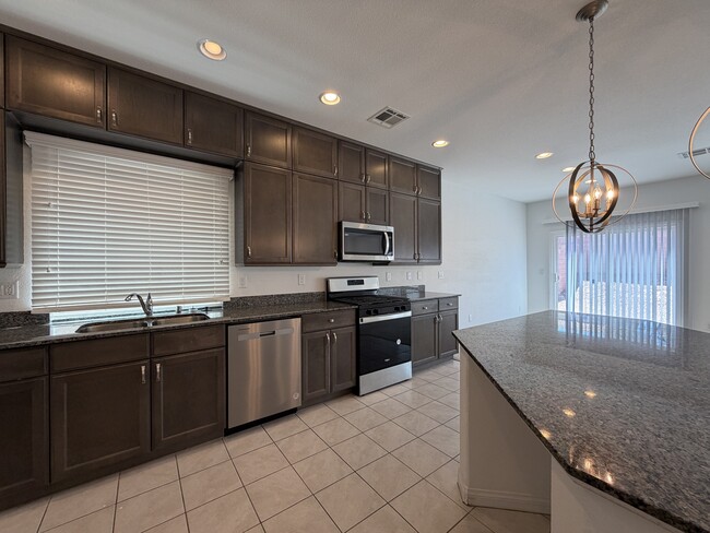 Building Photo - 7869 Tyrell Peaks St