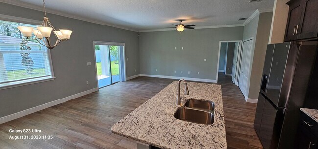 Building Photo - New 3/2/2.5 Home with Upgrades